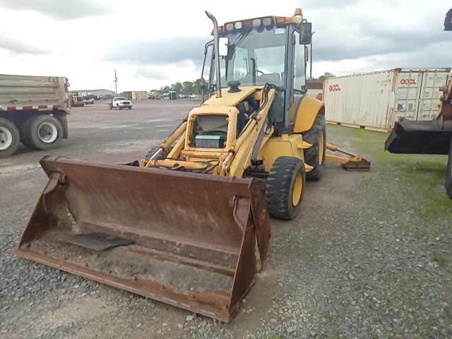 BUY NEWHOLLAND LB110 2001 TRACTOR LOADER BACKHOE - 4WD, Abingdon Auto Auction, Inc.